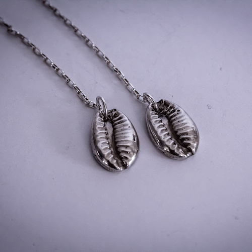 silver cowry shell dangle earrings