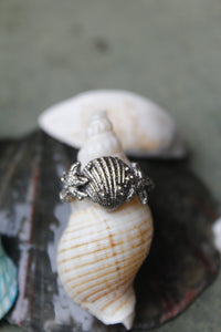 silver hand crafted shell and star fish ring